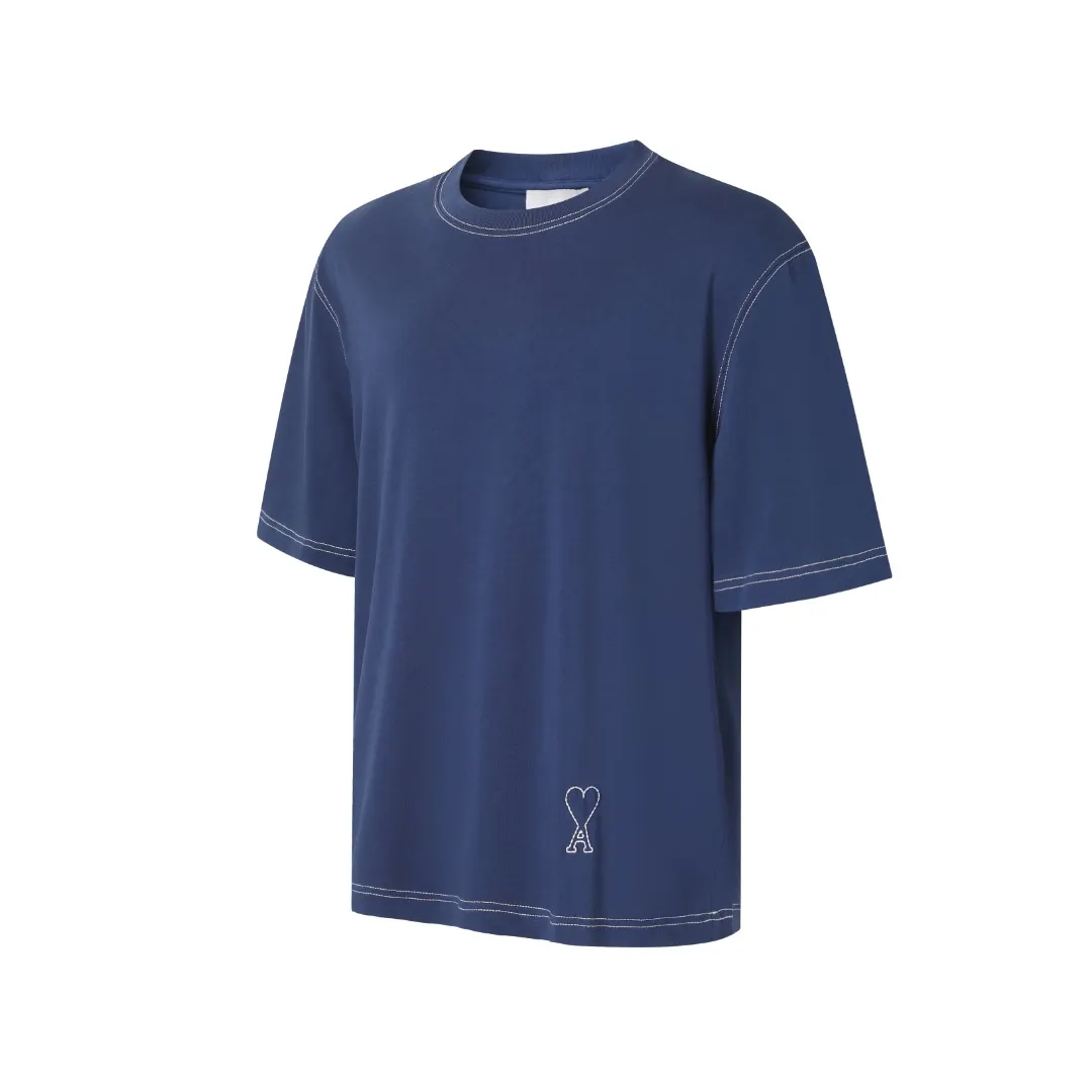 AMI Love A Embroidered Short Sleeve Fabric Selection: High-count pure cotton is selected, with moderate weight and natural drape. The cotton fiber itself has good moisture absorption and breathability, which can quickly absorb sweat and dissipate it outwards. At the same time, it feels soft and delicate, and it is non-itchy when worn next to the skin. After the pre-shrinking process, the washing shrinkage is greatly reduced, and it is not easy to deform after repeated machine washing. Craftsmanship: 1: The advanced computing system of imported embroidery machines is used to depict the contour lines of the love A pattern. White embroidery thread and Tibetan Blue fabric form a soft contrast, with neat edges, no skipping lines, and no burrs. The pattern is full and three-dimensional, and the texture is delicate. 2. Make dark embroidery of letters of the same color on the back neckline, using embroidery threads of the same color as the fabric, which is low-key and not obtrusive, and does not destroy the overall simple style. The back of the embroidered product is flat and has no bulges, and will not irritate the skin, taking into account both beauty and wearing comfort. Sewing details: 1: The collar, cuffs, hem, and shoulder lines are all made of contrasting topstitching and double-turn craftsmanship. The neatly routed threads form a sharp contrast with the Tibetan Blue fabric and outline the outline of the clothes. 2: The internal seams of the clothes are all treated with overlocking technology, without excess burrs or threads, and the details are clean and tidy; the hem and cuffs are made with double-folding stitching technology, and the edges are smooth and not frizzy to avoid curling and curling when wearing. Accessories: One-to-one customized three-standard Size: S M L XL Style No. D 292